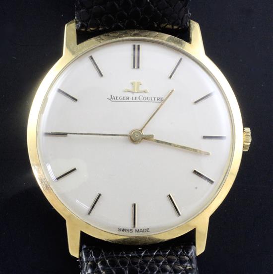 A Jaegar le Coultre 1961 18ct gold ultra thin gentlemans wristwatch, original buckle and replacement strap